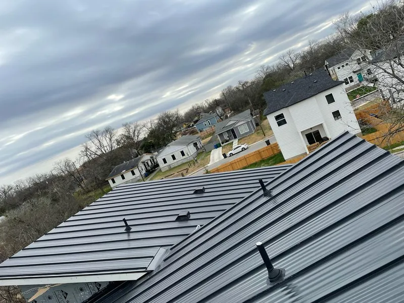 Standing seam metal roof panels with vents for Skylight Repair in Niles
